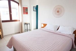Postel nebo postele na pokoji v ubytování Motel Cap Sol