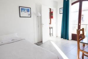 Postel nebo postele na pokoji v ubytování Motel Cap Sol