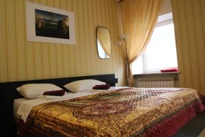 Katil atau katil-katil dalam bilik di Apartment Nevskaya Classica