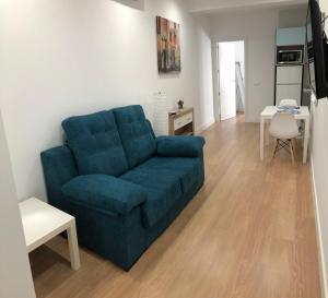 A seating area at Apartamentos Catedral Escalinata