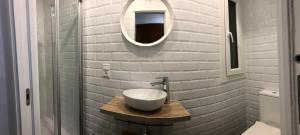 A bathroom at Apartamentos Catedral Escalinata
