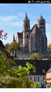 a large church in a town with buildings at Familiehuis Dolve 2 in Hartheim