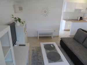 Kuchyň nebo kuchyňský kout v ubytování Apartman Eli 2