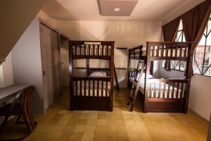 Postel nebo postele na pokoji v ubytování Casa de Juan Hostal