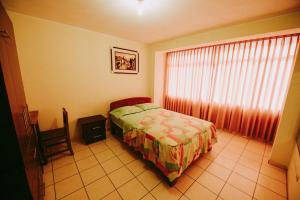 Postel nebo postele na pokoji v ubytování Hotel Las Viñas + 19 fotografií