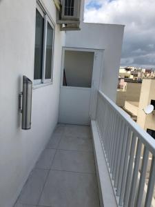 A balcony or terrace at Marsascala Sea View Apartment HPI 7738