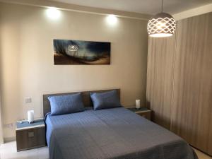 A bed or beds in a room at Marsascala Sea View Apartment HPI 7738