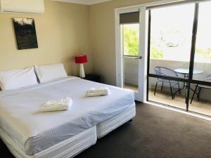 Postel nebo postele na pokoji v ubytování Huskisson Beach Escape