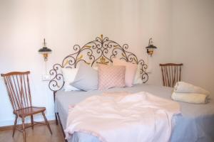 A bed or beds in a room at Casa Diana - WelcHome