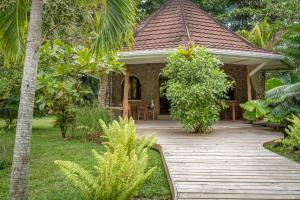 Vrt pred nastanitvijo Bliss Hotel Praslin