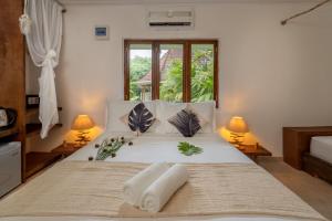 Postelja oz. postelje v sobi nastanitve Bliss Hotel Praslin