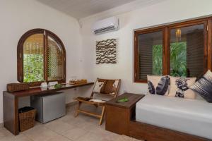 Predel za sedenje v nastanitvi Bliss Hotel Praslin
