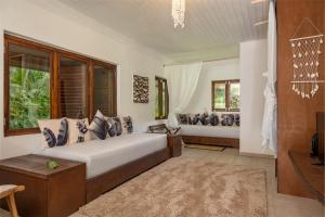 Postelja oz. postelje v sobi nastanitve Bliss Hotel Praslin