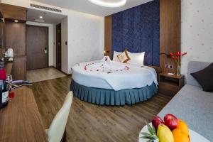 Giường trong phòng chung tại Vesna Hotel