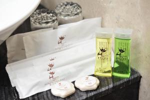 Voodi või voodid majutusasutuse Hallmark Regency Hotel - Johor Bahru toas