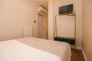 TV a/nebo společenská místnost v ubytování Luxury Suite Sirmione