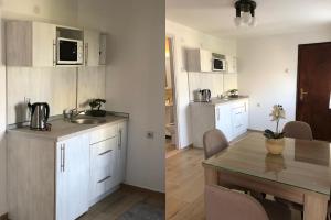 Kuchyňa alebo kuchynka v ubytovaní Apartments Ivan