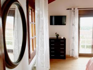 TV a/nebo společenská místnost v ubytování Estudio de encanto en Isla playa