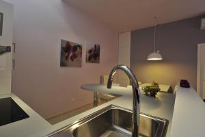 A kitchen or kitchenette at Foresteria Pellegrino