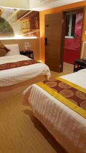 Whole Sunshine International Guest House 객실 침대