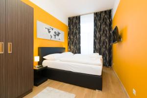 Łóżko lub łóżka w pokoju w obiekcie Vienna Stay Apartments Pezzl 1170