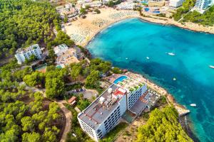 an aerial view of a resort and a beach at Palladium Hotel Cala Llonga - Adults Only in Cala Llonga +31 photos