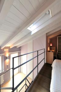 A bed or beds in a room at Foresteria Pellegrino