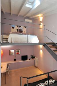 A bed or beds in a room at Foresteria Pellegrino