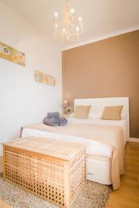 Posteľ alebo postele v izbe v ubytovaní Holidays2Malaga Terraza & junto puerto deportivo