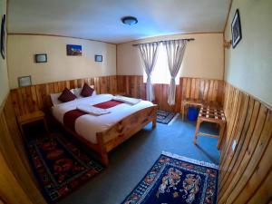 Кровать или кровати в номере Panorama Lodge and Restaurant