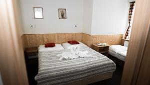 Posteľ alebo postele v izbe v ubytovaní Hotel Atlas