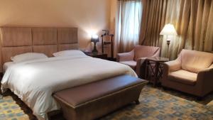 Letto o letti in una camera di Kai Wei Boutique Hotel