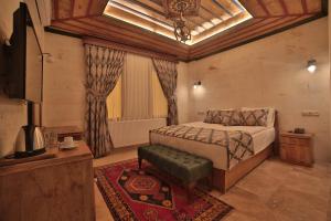 เตียงในห้องที่ Çakıltaşı Evi Otel