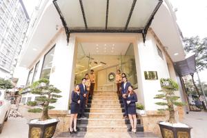 Členové personálu v ubytování A&D Luxury Hotel