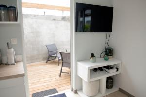 TV a/nebo společenská místnost v ubytování thomlocation