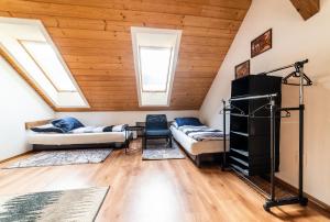 A bed or beds in a room at Žrebčín Mlynčok