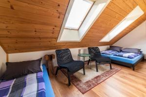 A bed or beds in a room at Žrebčín Mlynčok