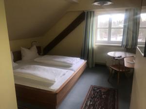 Ένα ή περισσότερα κρεβάτια σε δωμάτιο στο il castello