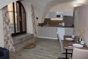 Kuchyň nebo kuchyňský kout v ubytování Apartmán U Gotického dvojčete