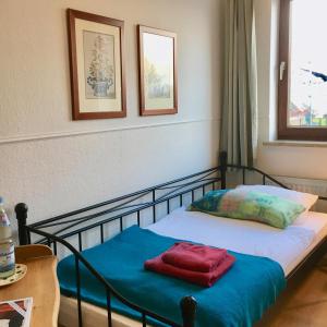 Ліжко або ліжка в номері Landgasthof Waabs Mühle