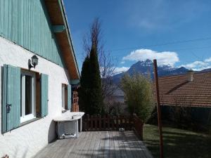 a porch of a house with a view of a mountain at Greselin in Chorges