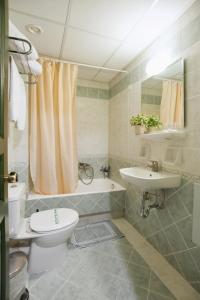 A bathroom at Artemis Hotel