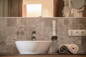 A bathroom at Weingut & Winzerhäuser Skringer