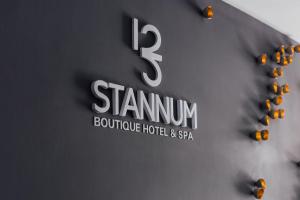 
a billboard with a picture of a train on it at Stannum Boutique Hotel & Spa in La Paz
