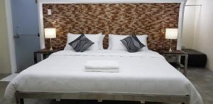 Postel nebo postele na pokoji v ubytování Cess Summer Boutique Hotel