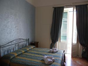 Ein Bett oder Betten in einem Zimmer der Unterkunft b&b new antico palazzo