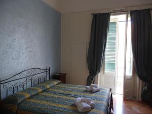 Postel nebo postele na pokoji v ubytování b&b new antico palazzo