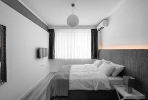 Lova arba lovos apgyvendinimo įstaigoje M&F Luxury Suites est. 2019 / F Suite