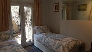 Postel nebo postele na pokoji v ubytování Oakley Hotel