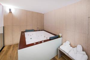 Voodi või voodid majutusasutuse Barceló Ourense toas